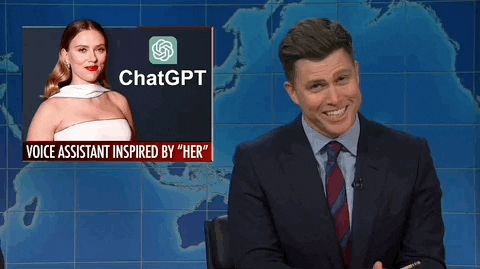 gif from SNL of Colin Jost laughing at news story of ChatGPT using Scarlett Johansson's voice for their chatbot, similarly to in "HER".
